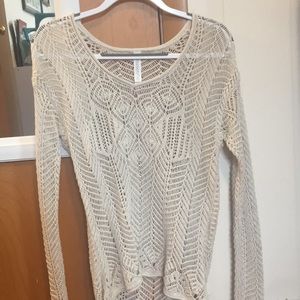 Adorable sweater with cute cut out design